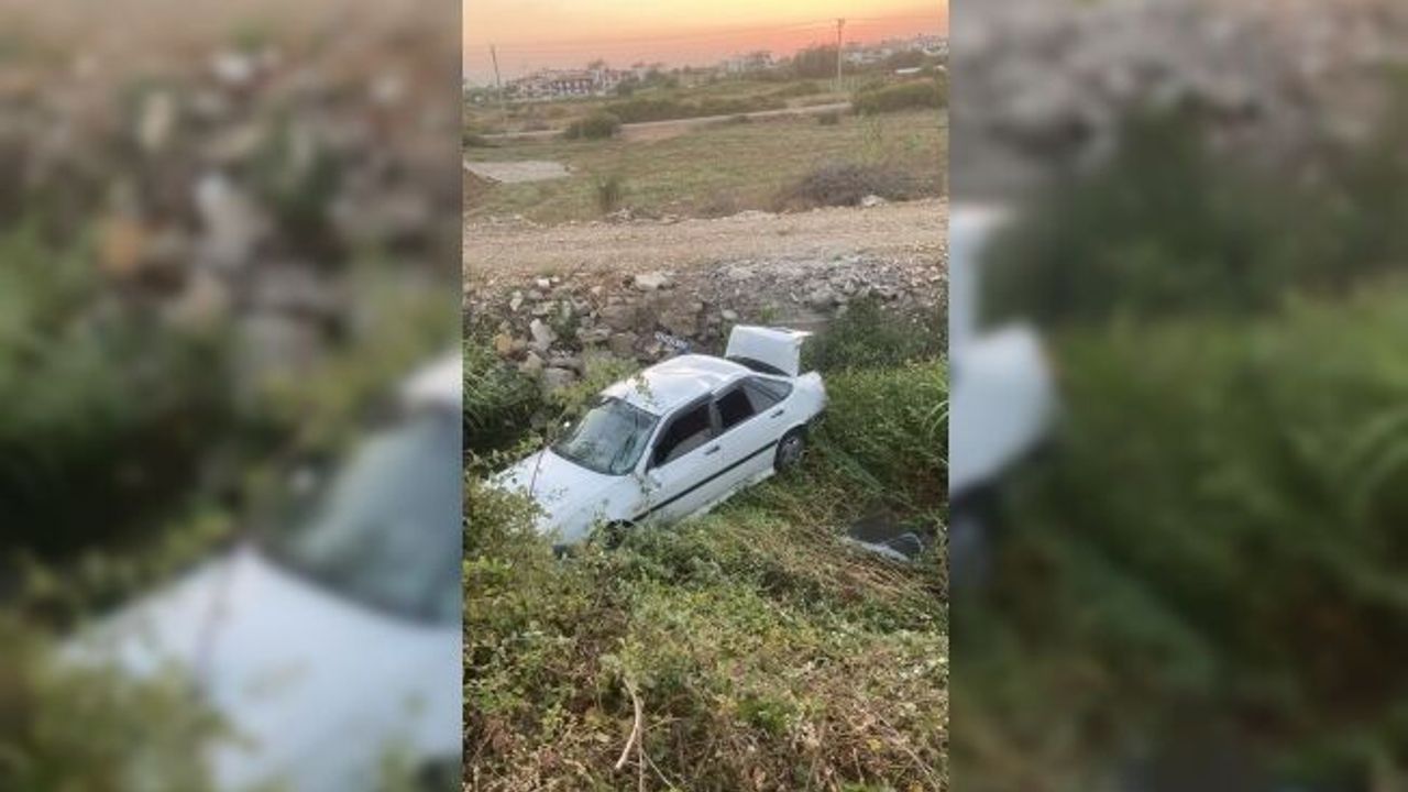 Sürücü belgesi olmadan kullandığı otomobille kanala uçtu