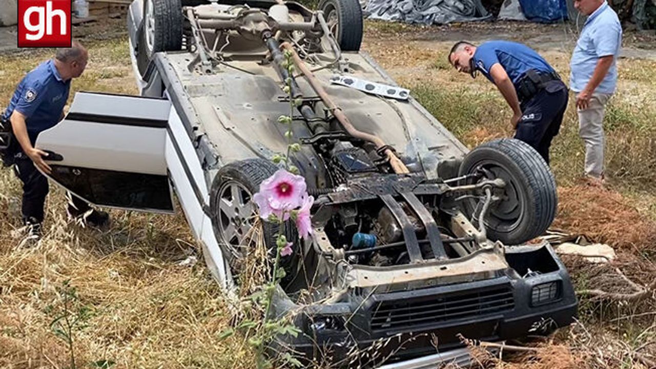  Boş araziye devrilip ters dönen otomobilde yaralı aradılar