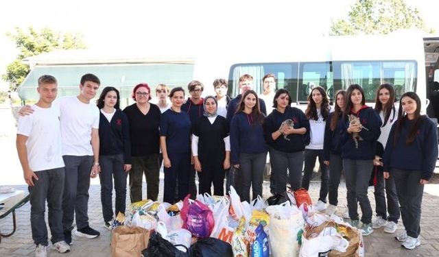 Aksu Belediyesi barınağında öğrencilerden “Sev, sahiplen, koru” mesajı